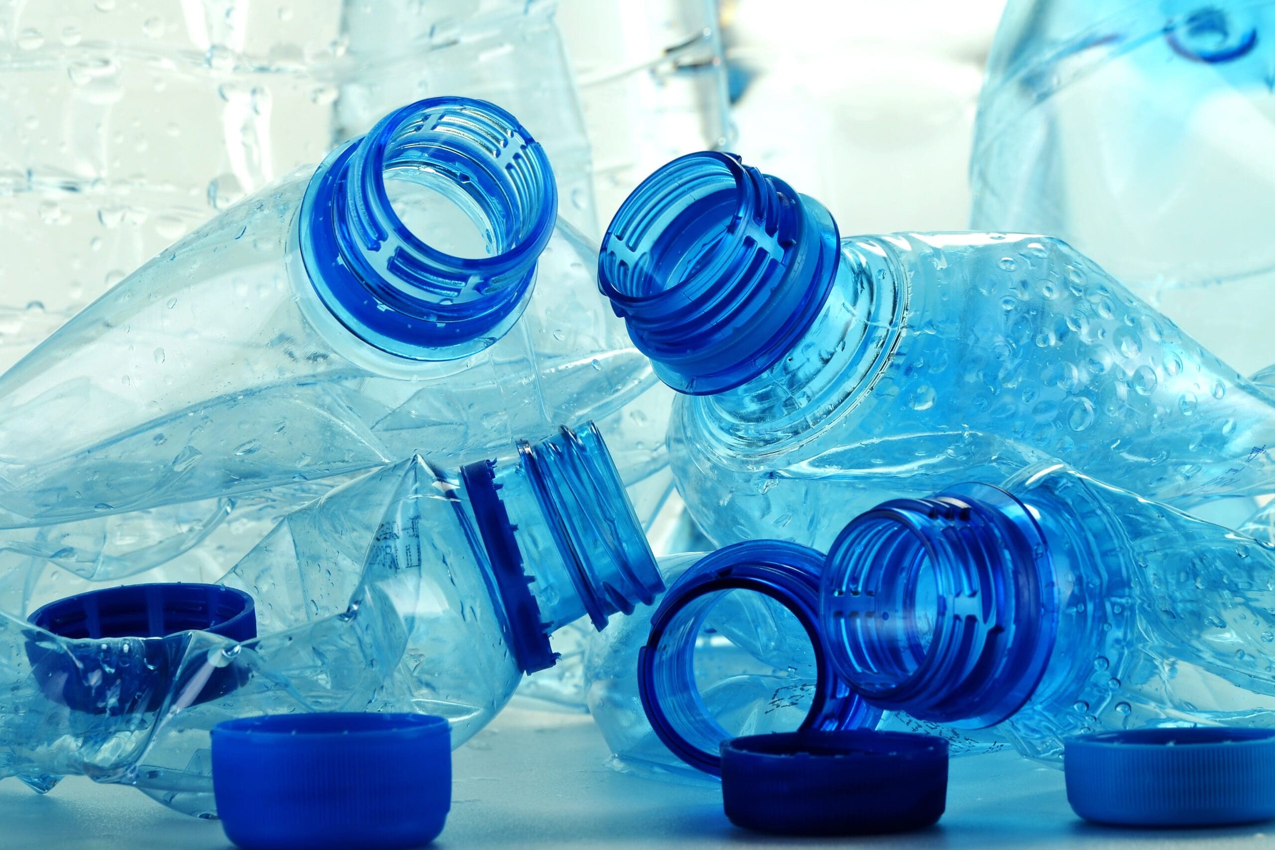 Composition with plastic bottles of mineral water. Plastic waste